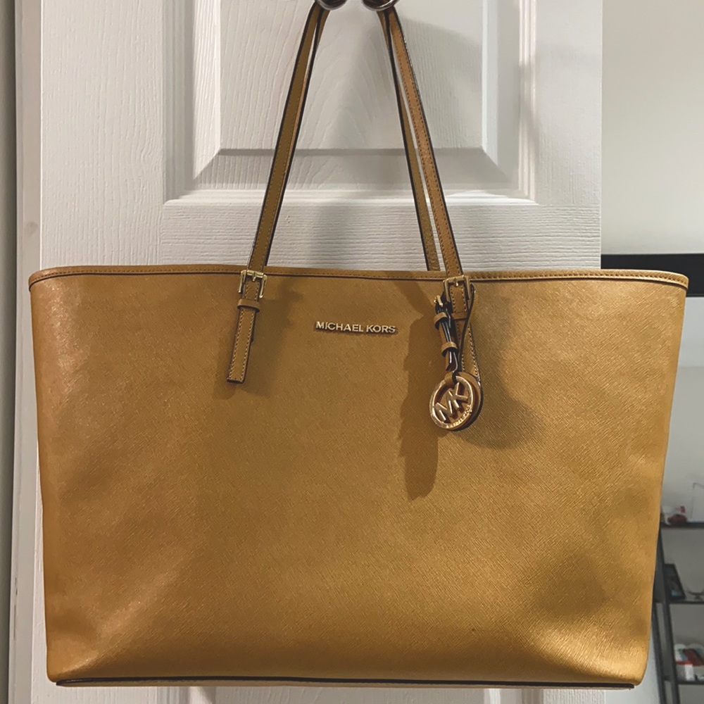 Michael’s Kors Hand Camel bag.